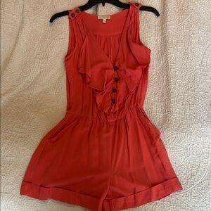 Gianni Bini Red/Coral Sleeveless Ruffled Romper with Snake Skin Belt